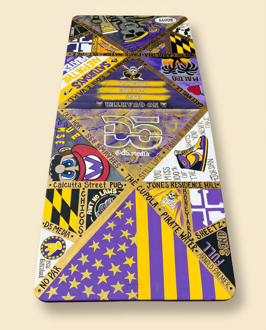Custom beer pong table with purple and gold design on a clean cream background