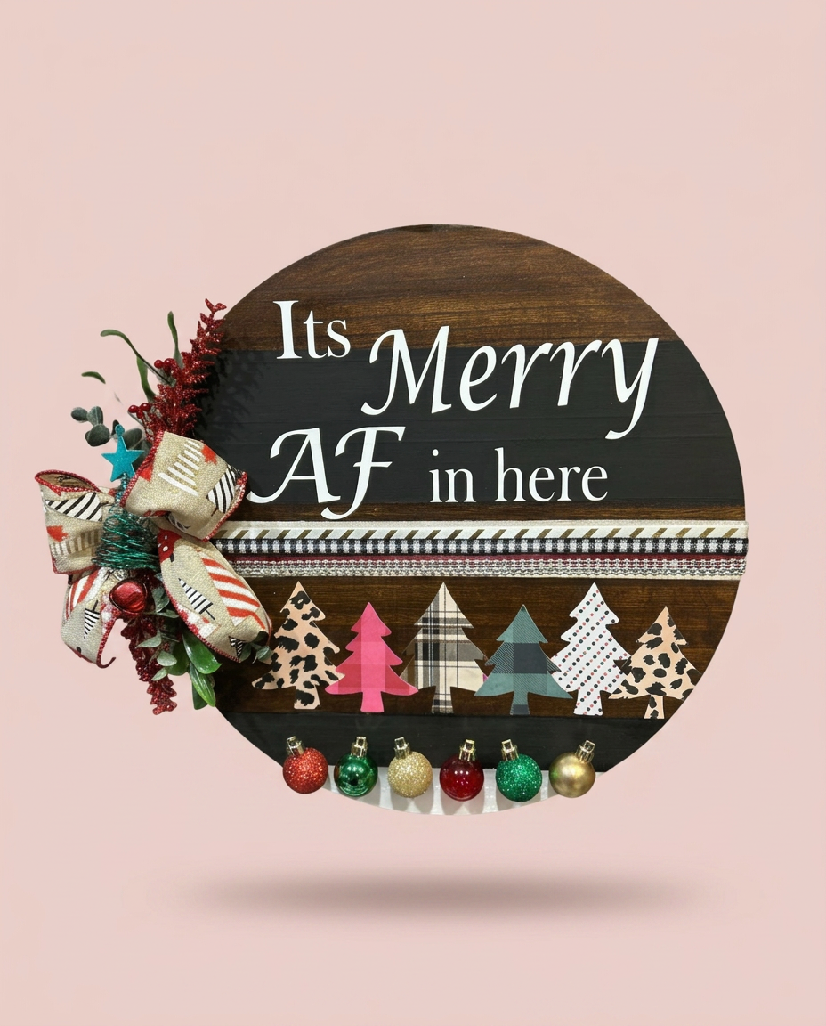 Round Christmas door sign with Merry AF lettering on a blush background